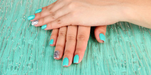 woman hands with blue manicure, Mahogany Salon and Spa, Ottawa nails
