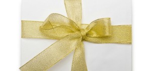 Promotions mahogany Envelope with colourful ribbon on white